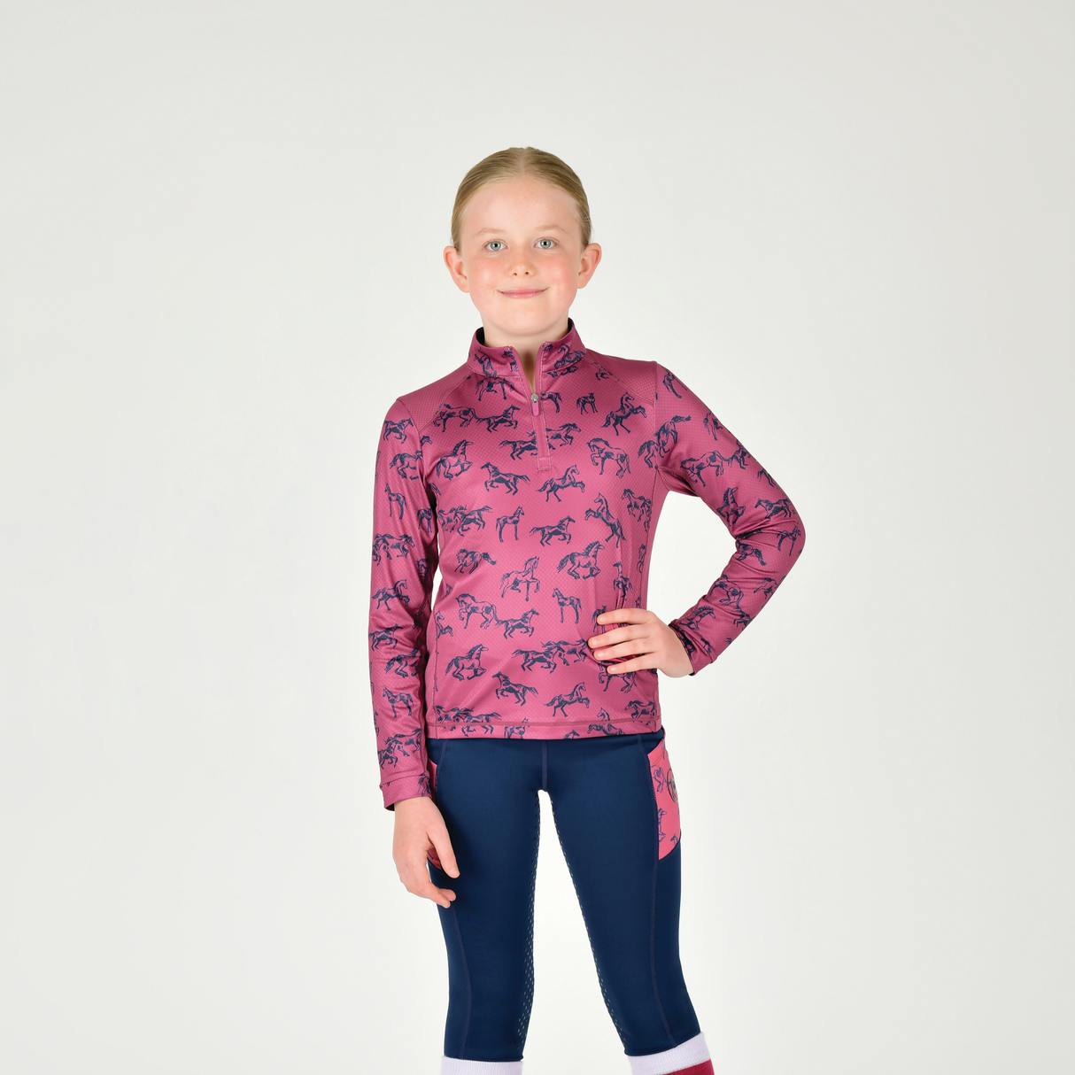 Dublin Kids Autumn Sally Long Sleeve Riding Top #colour_red-violet-frolicking-horses